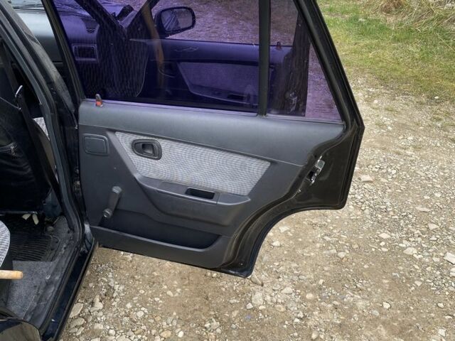 Черный Дэу Нексия, объемом двигателя 1.5 л и пробегом 90 тыс. км за 800 $, фото 8 на Automoto.ua