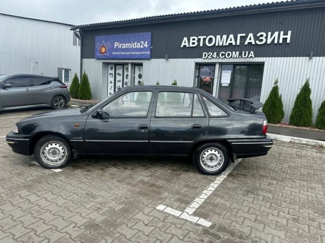 Черный Дэу Нексия, объемом двигателя 1.5 л и пробегом 213 тыс. км за 850 $, фото 6 на Automoto.ua