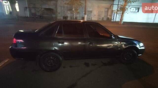 Чорний Деу Нексія, об'ємом двигуна 1.5 л та пробігом 220 тис. км за 1200 $, фото 4 на Automoto.ua