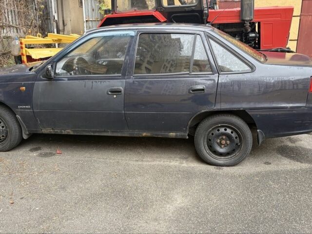 Чорний Деу Нексія, об'ємом двигуна 1.5 л та пробігом 200 тис. км за 1650 $, фото 1 на Automoto.ua