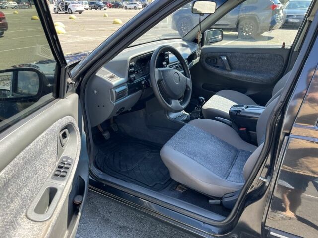 Чорний Деу Нексія, об'ємом двигуна 1.5 л та пробігом 140 тис. км за 2650 $, фото 7 на Automoto.ua