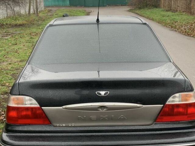 Черный Дэу Нексия, объемом двигателя 1.5 л и пробегом 200 тыс. км за 999 $, фото 5 на Automoto.ua