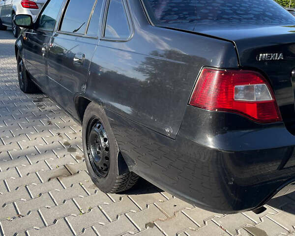 Черный Дэу Нексия, объемом двигателя 1.5 л и пробегом 34 тыс. км за 1200 $, фото 5 на Automoto.ua