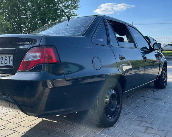 Черный Дэу Нексия, объемом двигателя 1.5 л и пробегом 34 тыс. км за 1200 $, фото 6 на Automoto.ua