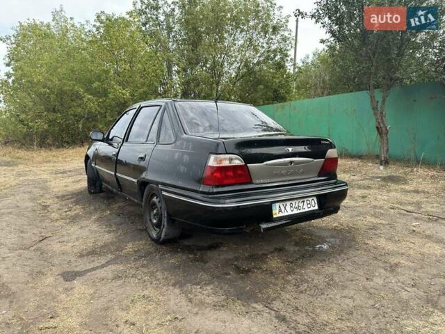 Черный Дэу Нексия, объемом двигателя 1.5 л и пробегом 212 тыс. км за 1198 $, фото 5 на Automoto.ua
