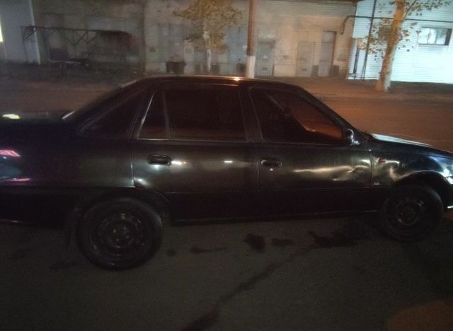 Чорний Деу Нексія, об'ємом двигуна 0 л та пробігом 220 тис. км за 1200 $, фото 5 на Automoto.ua
