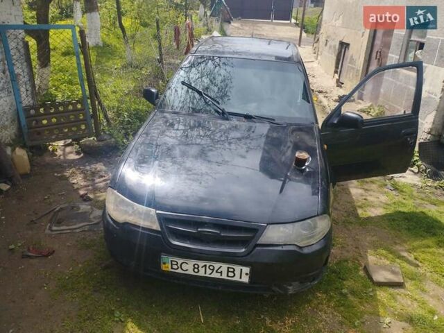 Чорний Деу Нексія, об'ємом двигуна 1.5 л та пробігом 260 тис. км за 1500 $, фото 5 на Automoto.ua