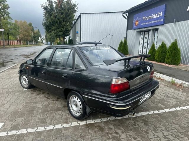 Черный Дэу Нексия, объемом двигателя 1.5 л и пробегом 213 тыс. км за 850 $, фото 7 на Automoto.ua