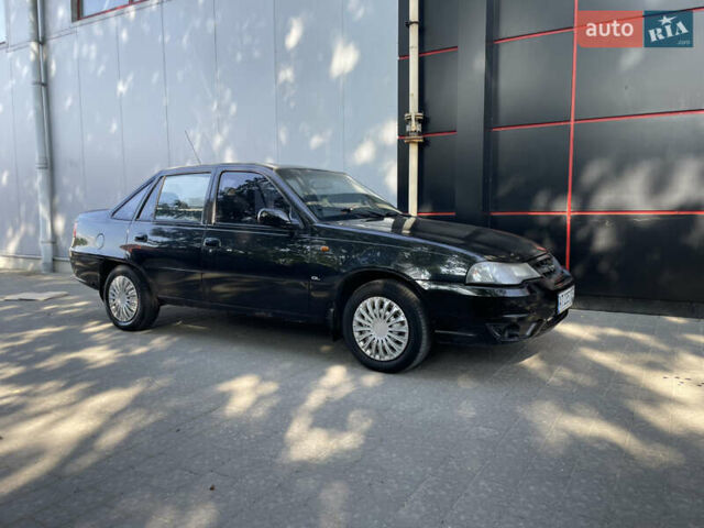Черный Дэу Нексия, объемом двигателя 1.5 л и пробегом 170 тыс. км за 1400 $, фото 1 на Automoto.ua