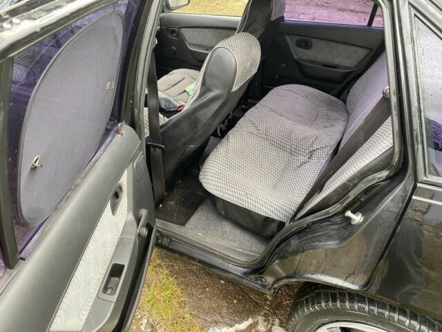 Черный Дэу Нексия, объемом двигателя 1.5 л и пробегом 90 тыс. км за 800 $, фото 12 на Automoto.ua