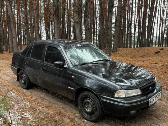 Черный Дэу Нексия, объемом двигателя 1.5 л и пробегом 570 тыс. км за 950 $, фото 2 на Automoto.ua