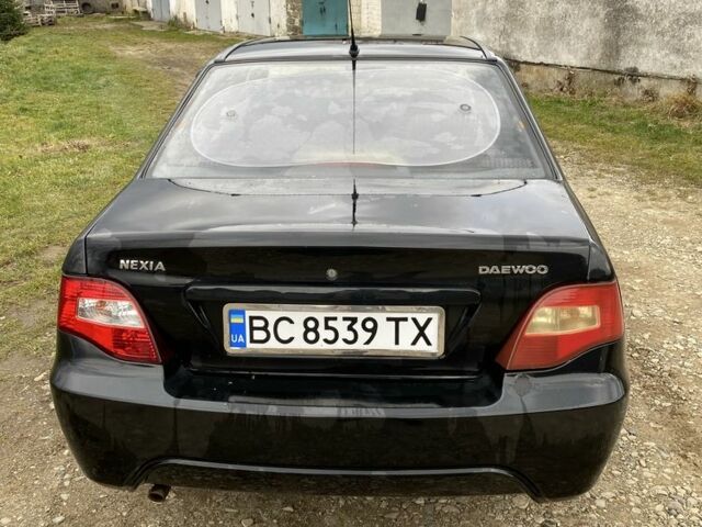 Черный Дэу Нексия, объемом двигателя 1.5 л и пробегом 90 тыс. км за 800 $, фото 2 на Automoto.ua