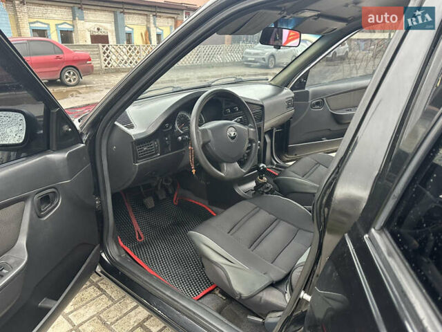 Чорний Деу Нексія, об'ємом двигуна 1.5 л та пробігом 260 тис. км за 2000 $, фото 11 на Automoto.ua