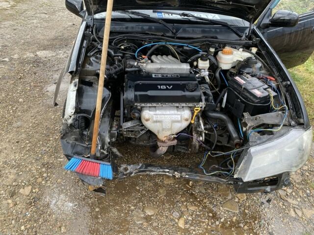 Черный Дэу Нексия, объемом двигателя 1.5 л и пробегом 90 тыс. км за 800 $, фото 14 на Automoto.ua