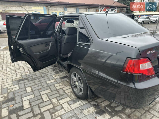 Чорний Деу Нексія, об'ємом двигуна 1.5 л та пробігом 260 тис. км за 2000 $, фото 14 на Automoto.ua