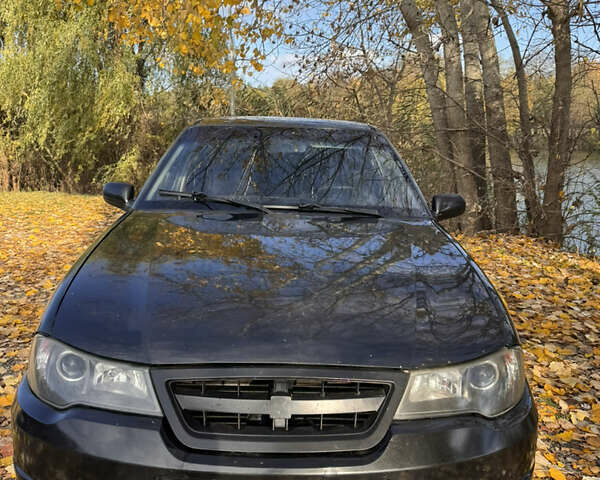 Чорний Деу Нексія, об'ємом двигуна 1.5 л та пробігом 230 тис. км за 1880 $, фото 1 на Automoto.ua