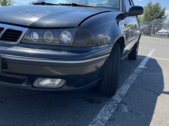 Чорний Деу Нексія, об'ємом двигуна 1.5 л та пробігом 140 тис. км за 2650 $, фото 2 на Automoto.ua