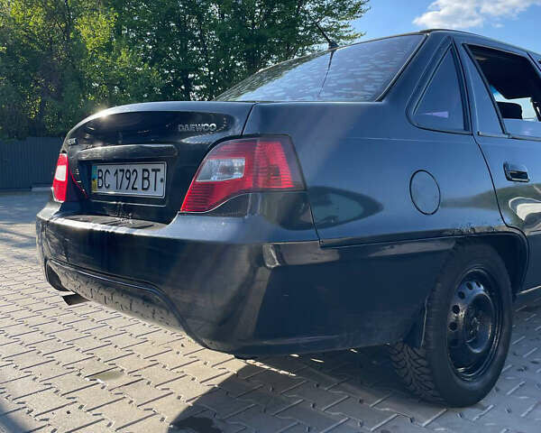 Черный Дэу Нексия, объемом двигателя 1.5 л и пробегом 34 тыс. км за 1200 $, фото 4 на Automoto.ua