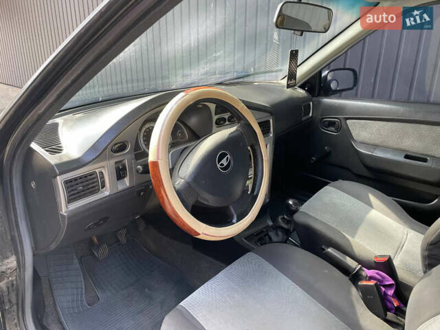 Черный Дэу Нексия, объемом двигателя 1.5 л и пробегом 170 тыс. км за 1400 $, фото 6 на Automoto.ua