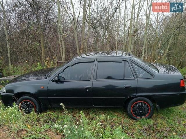 Чорний Деу Нексія, об'ємом двигуна 1.6 л та пробігом 378 тис. км за 1400 $, фото 6 на Automoto.ua