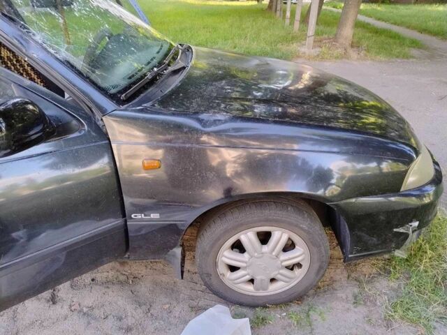 Черный Дэу Нексия, объемом двигателя 1.5 л и пробегом 86 тыс. км за 962 $, фото 3 на Automoto.ua