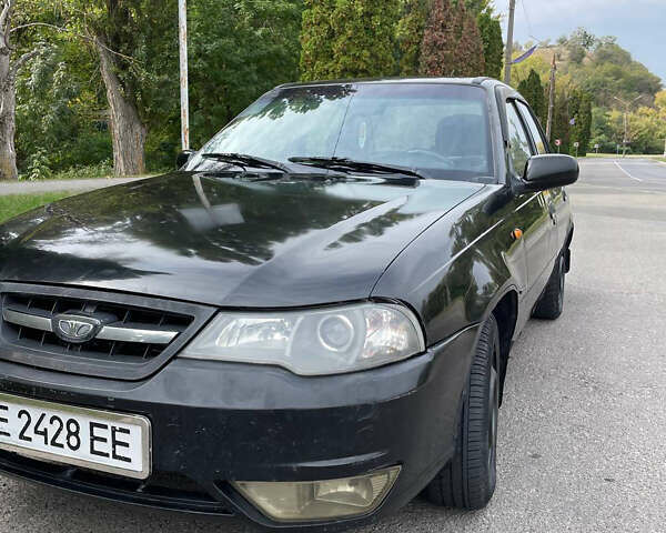Чорний Деу Нексія, об'ємом двигуна 1.6 л та пробігом 320 тис. км за 1600 $, фото 1 на Automoto.ua