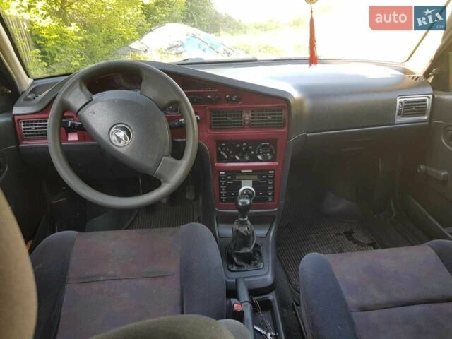 Черный Дэу Нексия, объемом двигателя 1.6 л и пробегом 237 тыс. км за 1300 $, фото 11 на Automoto.ua