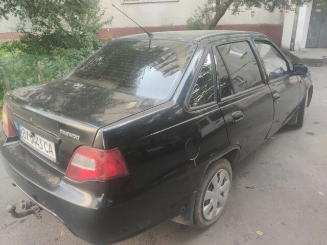 Черный Дэу Нексия, объемом двигателя 1.6 л и пробегом 237 тыс. км за 1300 $, фото 4 на Automoto.ua