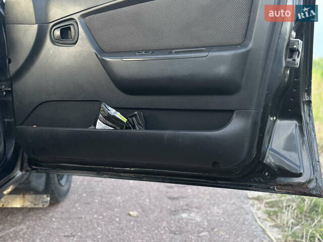 Деу Нексія 2009 у Овруче на Automoto.ua Чорний Деу Нексія, об'ємом двигуна 1.6 л та пробігом 204 тис. км за 2500 $, фото 20 на Automoto.ua