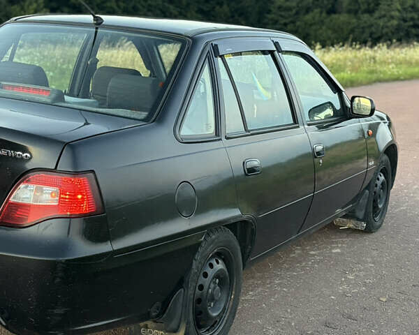 Деу Нексія 2009 у Овруче на Automoto.ua Чорний Деу Нексія, об'ємом двигуна 1.6 л та пробігом 204 тис. км за 2500 $, фото 10 на Automoto.ua