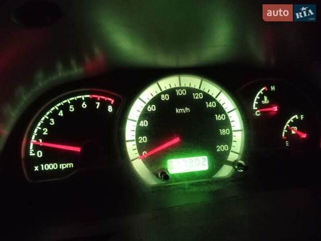 Чорний Деу Нексія, об'ємом двигуна 1.6 л та пробігом 378 тис. км за 1400 $, фото 1 на Automoto.ua