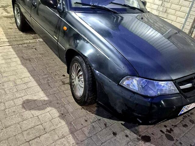 Черный Дэу Нексия, объемом двигателя 1.5 л и пробегом 250 тыс. км за 1400 $, фото 4 на Automoto.ua