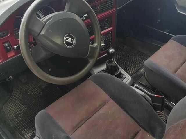 Черный Дэу Нексия, объемом двигателя 1.6 л и пробегом 237 тыс. км за 1300 $, фото 10 на Automoto.ua