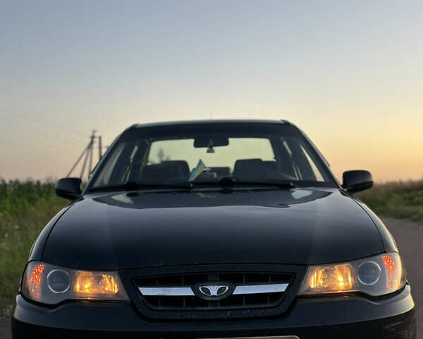 Деу Нексія 2009 у Овруче на Automoto.ua Чорний Деу Нексія, об'ємом двигуна 1.6 л та пробігом 204 тис. км за 2500 $, фото 4 на Automoto.ua