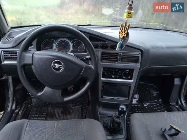 Чорний Деу Нексія, об'ємом двигуна 1.6 л та пробігом 378 тис. км за 1400 $, фото 4 на Automoto.ua