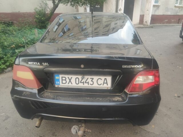 Черный Дэу Нексия, объемом двигателя 1.6 л и пробегом 237 тыс. км за 1300 $, фото 6 на Automoto.ua