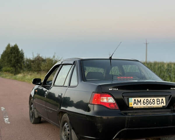 Деу Нексія 2009 у Овруче на Automoto.ua Чорний Деу Нексія, об'ємом двигуна 1.6 л та пробігом 204 тис. км за 2500 $, фото 12 на Automoto.ua