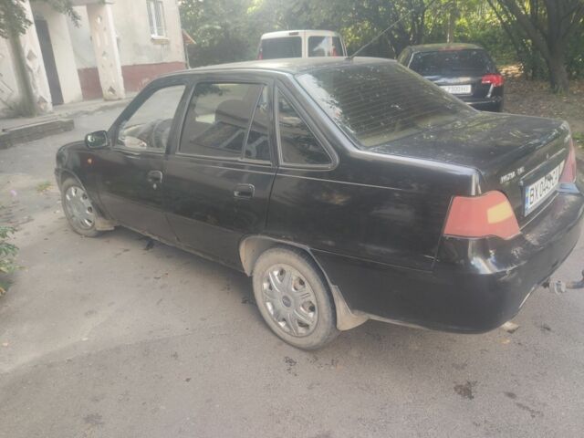 Черный Дэу Нексия, объемом двигателя 1.6 л и пробегом 237 тыс. км за 1300 $, фото 5 на Automoto.ua