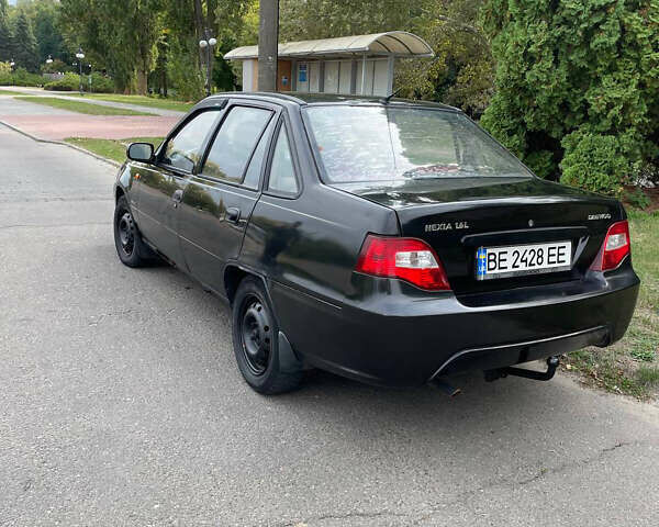 Чорний Деу Нексія, об'ємом двигуна 1.6 л та пробігом 320 тис. км за 1600 $, фото 5 на Automoto.ua