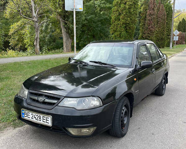 Чорний Деу Нексія, об'ємом двигуна 1.6 л та пробігом 320 тис. км за 1600 $, фото 2 на Automoto.ua