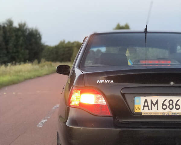 Деу Нексія 2009 у Овруче на Automoto.ua Чорний Деу Нексія, об'ємом двигуна 1.6 л та пробігом 204 тис. км за 2500 $, фото 14 на Automoto.ua