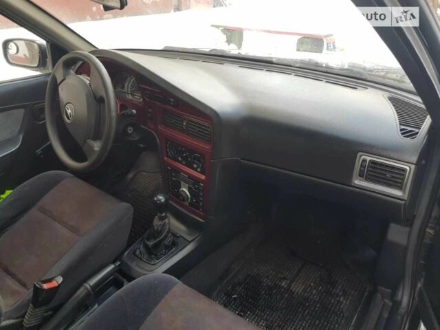 Черный Дэу Нексия, объемом двигателя 1.6 л и пробегом 237 тыс. км за 1300 $, фото 8 на Automoto.ua