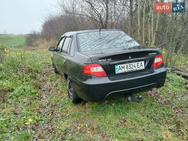 Чорний Деу Нексія, об'ємом двигуна 1.6 л та пробігом 378 тис. км за 1400 $, фото 7 на Automoto.ua