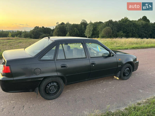 Деу Нексія 2009 у Овруче на Automoto.ua Чорний Деу Нексія, об'ємом двигуна 1.6 л та пробігом 204 тис. км за 2500 $, фото 11 на Automoto.ua