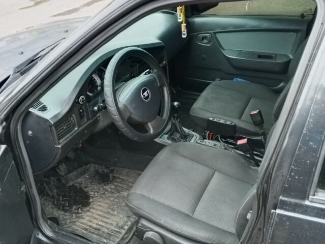 Чорний Деу Нексія, об'ємом двигуна 1.5 л та пробігом 334 тис. км за 1400 $, фото 6 на Automoto.ua