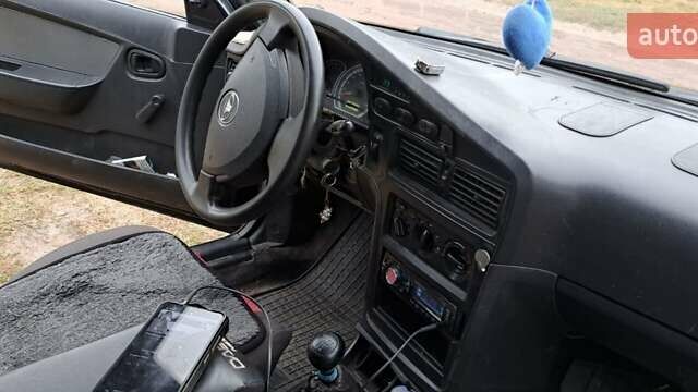Черный Дэу Нексия, объемом двигателя 1.5 л и пробегом 112 тыс. км за 1500 $, фото 2 на Automoto.ua