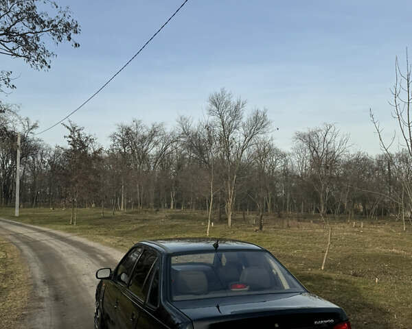 Чорний Деу Нексія, об'ємом двигуна 1.5 л та пробігом 141 тис. км за 2500 $, фото 3 на Automoto.ua