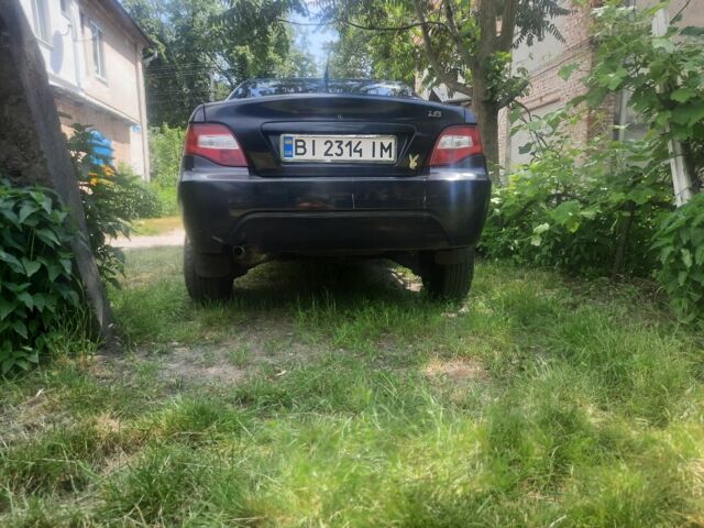 Черный Дэу Нексия, объемом двигателя 1.6 л и пробегом 250 тыс. км за 1700 $, фото 3 на Automoto.ua