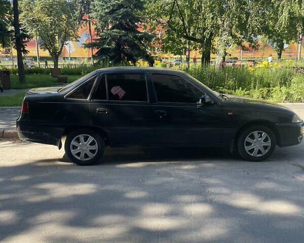 Черный Дэу Нексия, объемом двигателя 1.5 л и пробегом 178 тыс. км за 2350 $, фото 3 на Automoto.ua