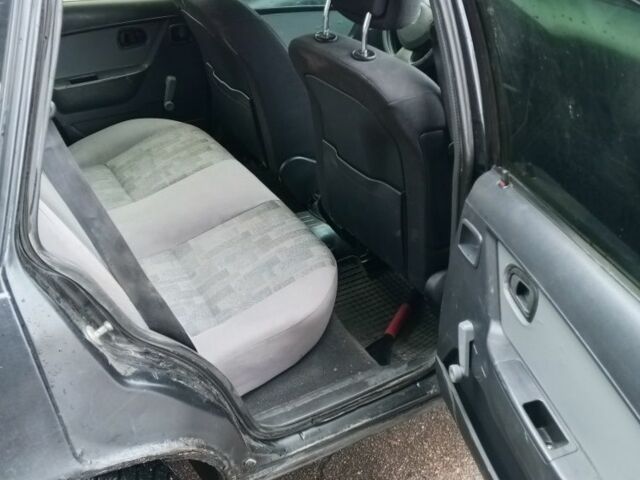 Чорний Деу Нексія, об'ємом двигуна 1.5 л та пробігом 334 тис. км за 1400 $, фото 8 на Automoto.ua